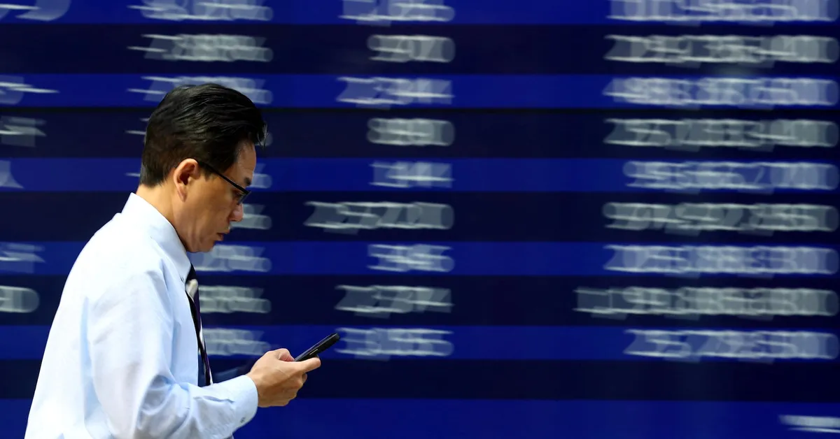 Asian Shares Retreat as Investors Brace for Key Economic Events