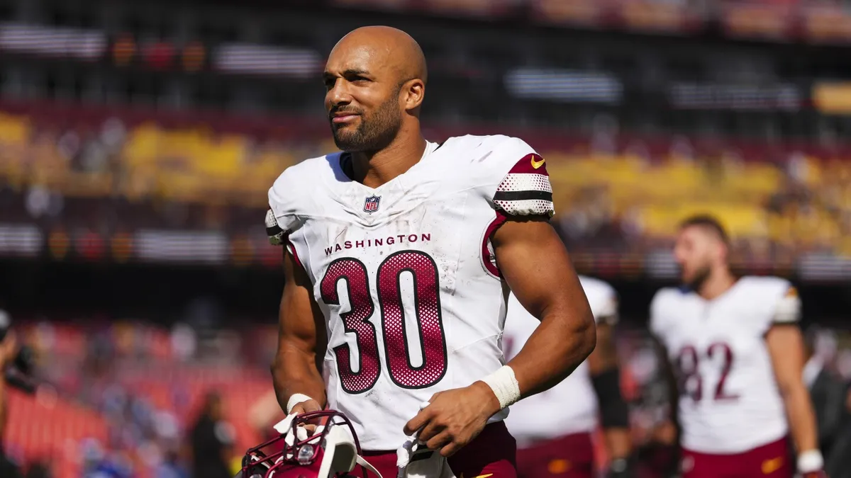 Austin Ekeler's Achilles Tear: Commanders' Star RB Out for the Season
