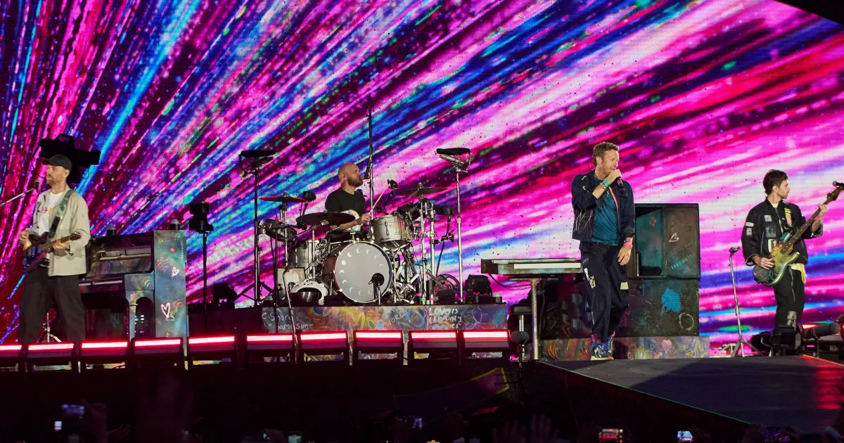 Coldplay's Chris Martin Calls Out Shy Couple on Kiss Cam: Are They Cheating?