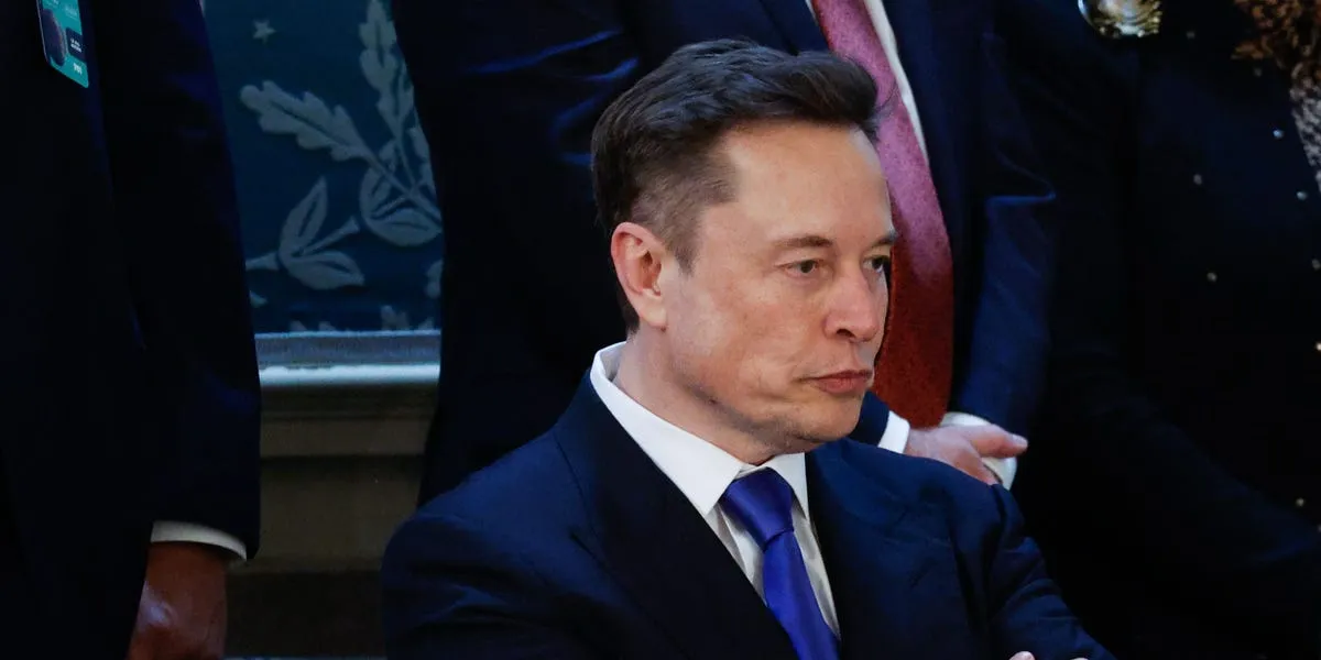 Elon Musk Warns of Bumpy Road Ahead for Tesla Amid Revenue Decline