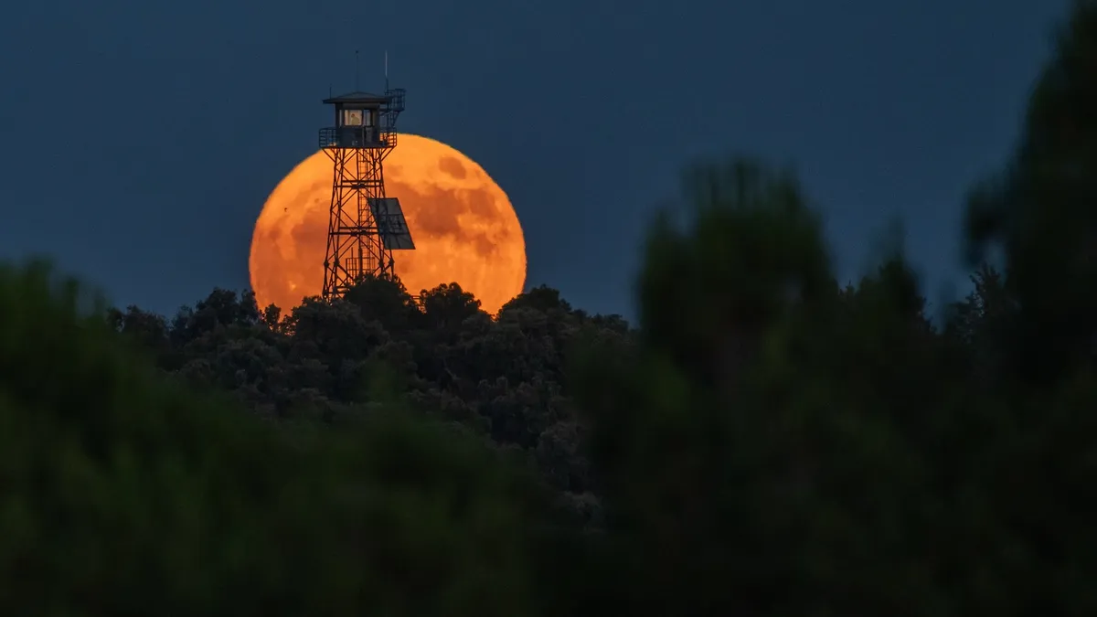 Experience the Magic of the Strawberry Moon: The Lowest Full Moon of the Year!