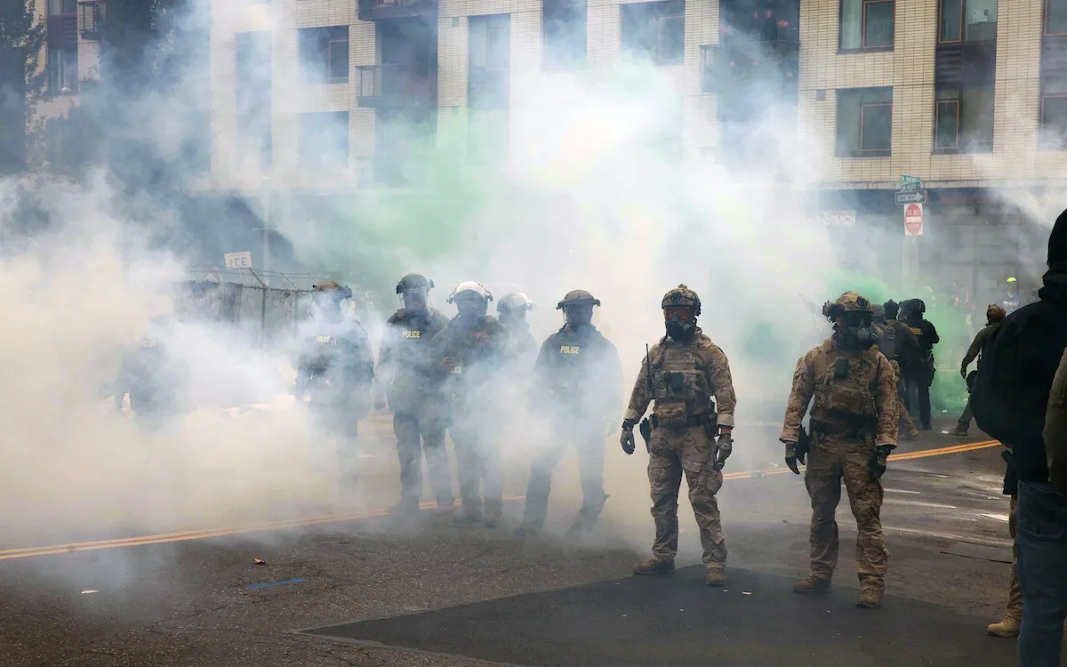 Federal Agents Clash with Protesters: Chemical Crowd Control Used in ICE Protest