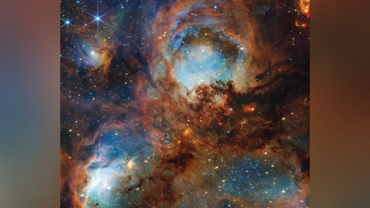 James Webb Telescope Unveils Stunning Star-Forming Cluster in Cat's Paw Nebula