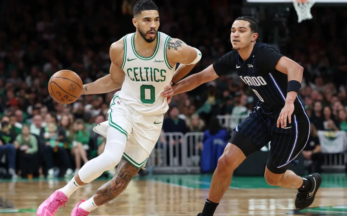 Jayson Tatum Shines Through Injury: Celtics Dominate Magic in Playoffs