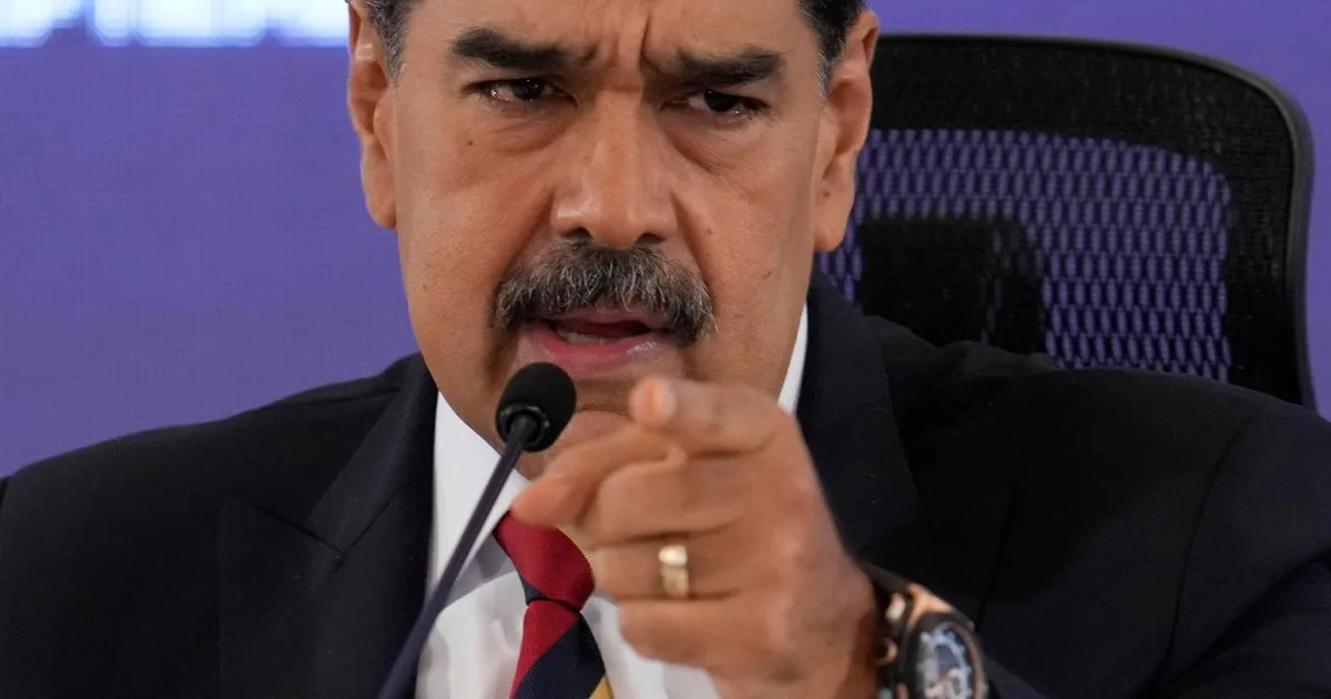 Maduro Threatens Armed Resistance as U.S. Military Gathers Near Venezuela
