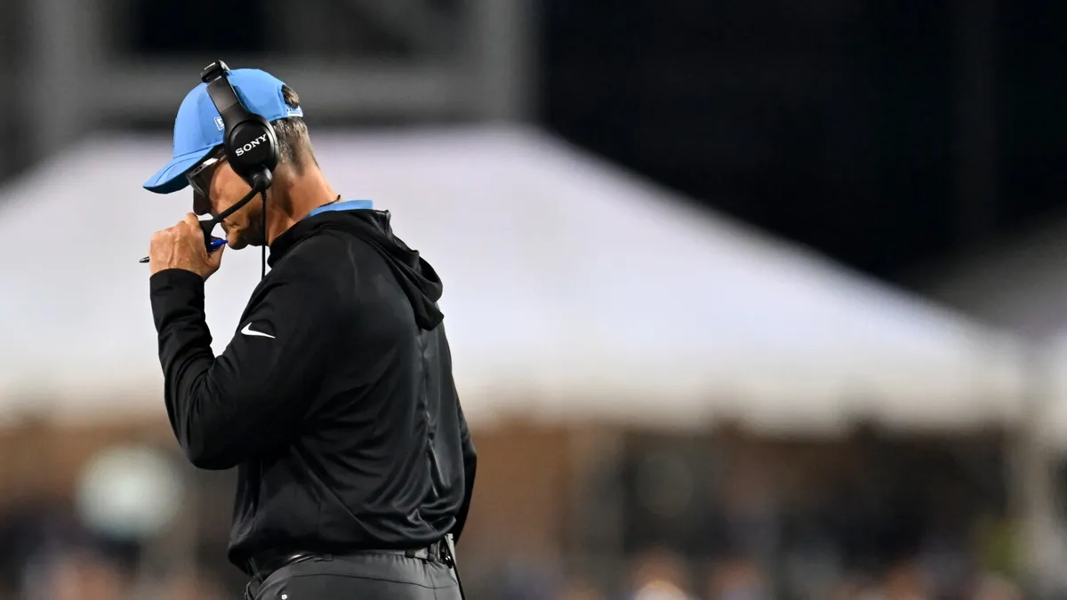 NCAA Slaps Jim Harbaugh with 10-Year Show Cause Order Amid Scandal