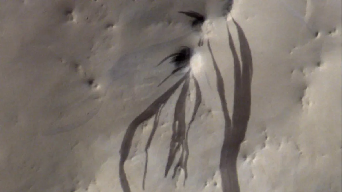 New Study Reveals Mars' Mysterious Streaks Are Dust, Not Water