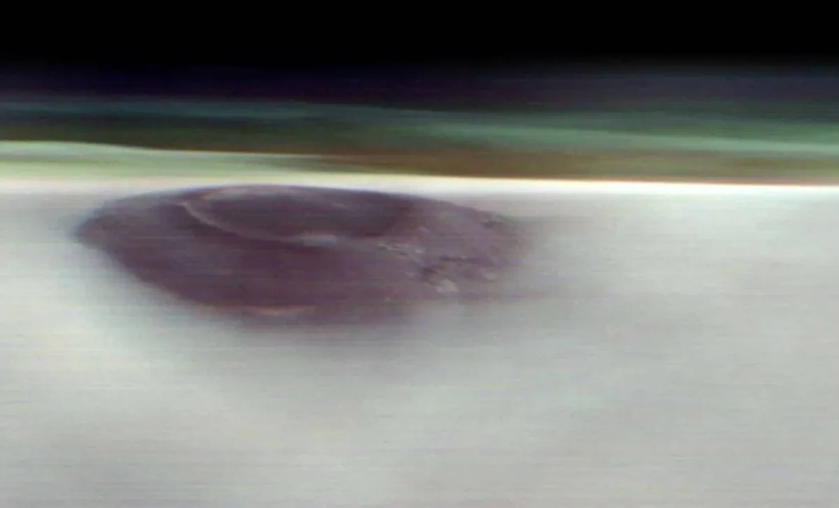 Stunning NASA Image Reveals Majestic Peak Breaking Through Martian Clouds