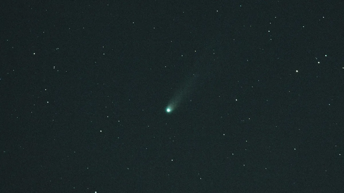 Witness the Stunning Journey of Comet Lemmon Through the Cosmic Serpent